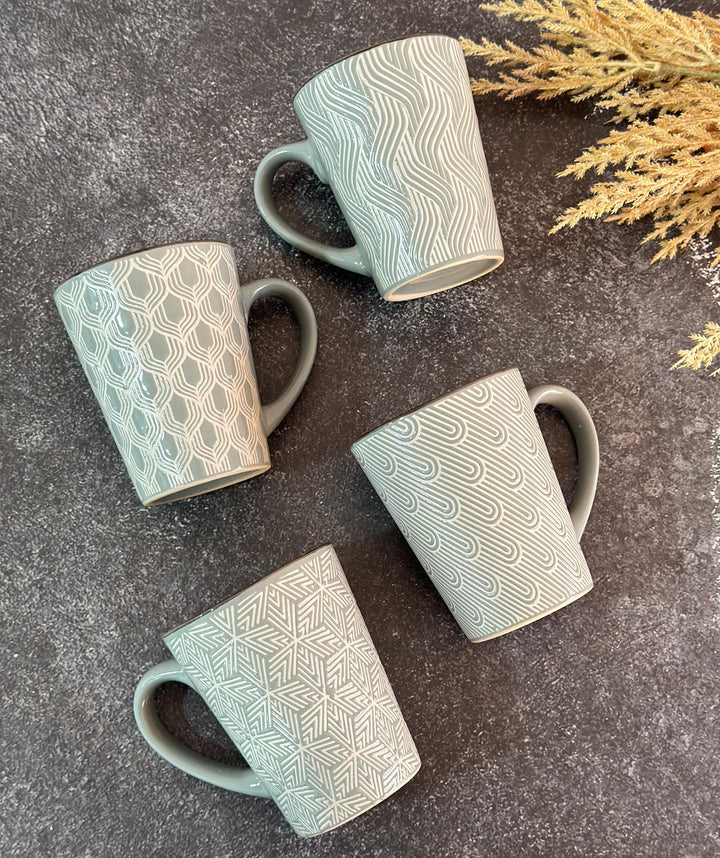 Set 4 mugs avec motifs 10,50x8,50cm